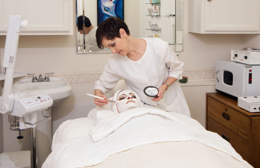 Jody applies a facial mask.